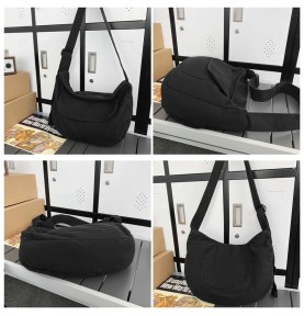 Minimalist black canvas shoulder bag